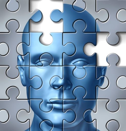 Puzzle of a mans face with pieces missing