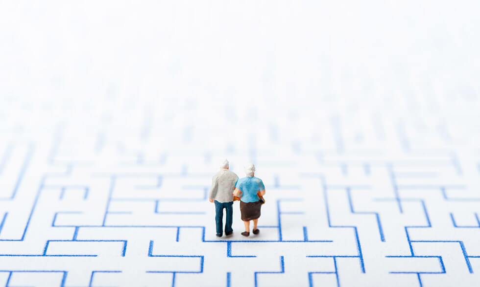 Elderly couple in the middle of a large maze