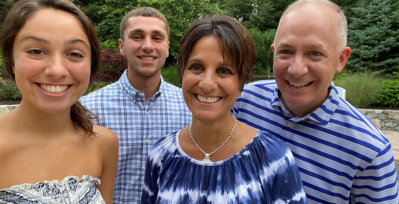 Cheryll Plunkett, middle, with her daughter, son, and husband.