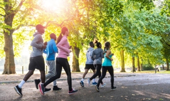 Group of people jogging in a park