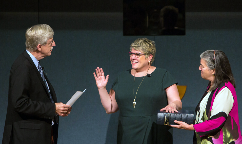 National Institutes of Health Director Francis S. Collins, M.D., Ph.D., swears in Patricia Flatley Brennan, R.N., Ph.D., as the 19th director of NLM.